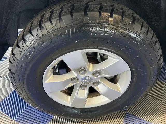 used 2014 Ram 1500 car, priced at $17,999
