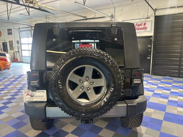 used 2010 Jeep Wrangler Unlimited car, priced at $14,999