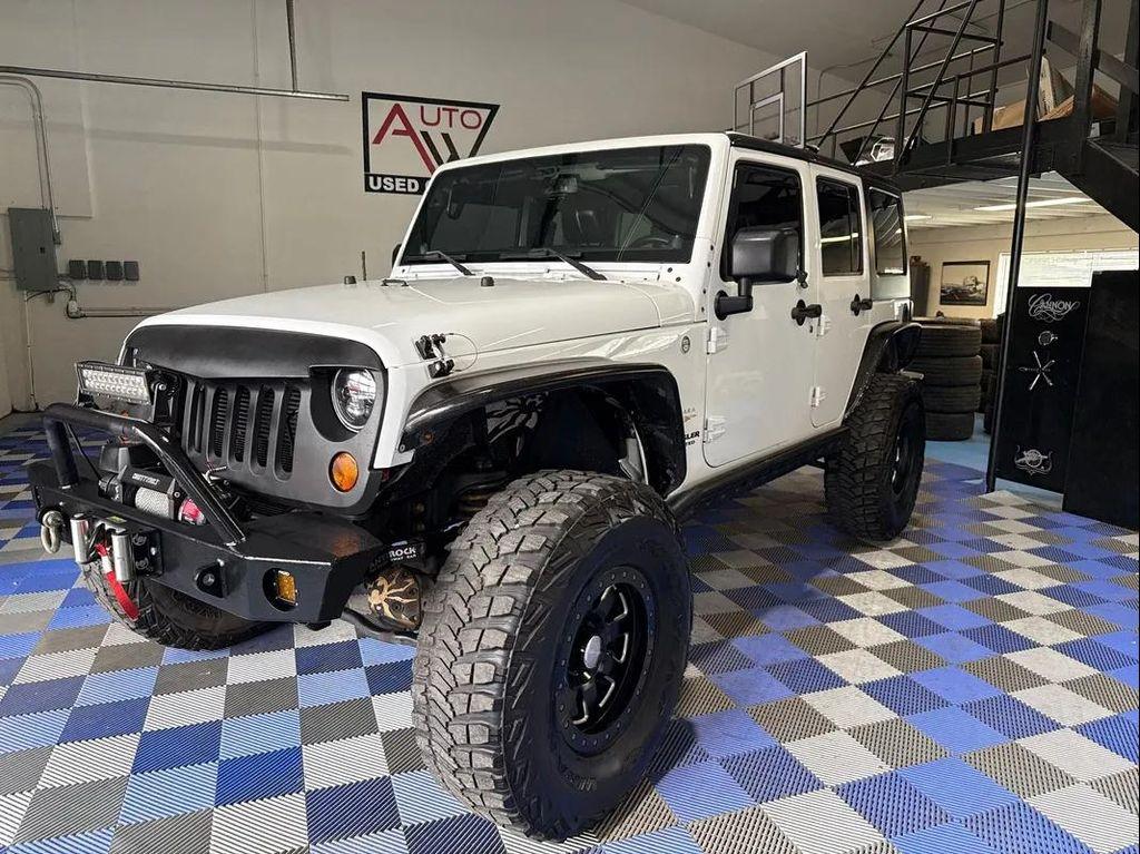 used 2013 Jeep Wrangler Unlimited car, priced at $16,988