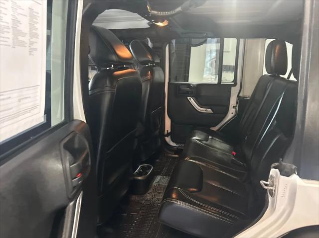 used 2013 Jeep Wrangler Unlimited car, priced at $16,988
