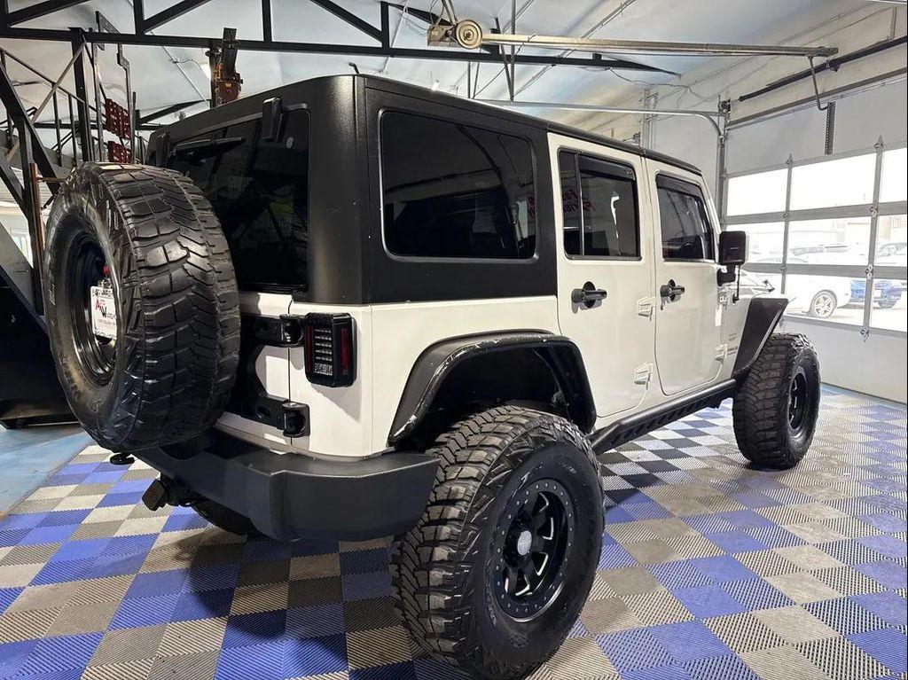 used 2013 Jeep Wrangler Unlimited car, priced at $16,988