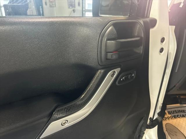 used 2013 Jeep Wrangler Unlimited car, priced at $16,988