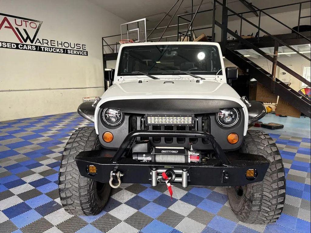 used 2013 Jeep Wrangler Unlimited car, priced at $16,988