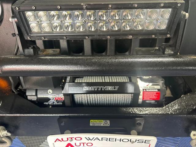 used 2013 Jeep Wrangler Unlimited car, priced at $16,988
