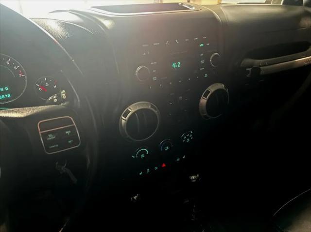 used 2013 Jeep Wrangler Unlimited car, priced at $16,988