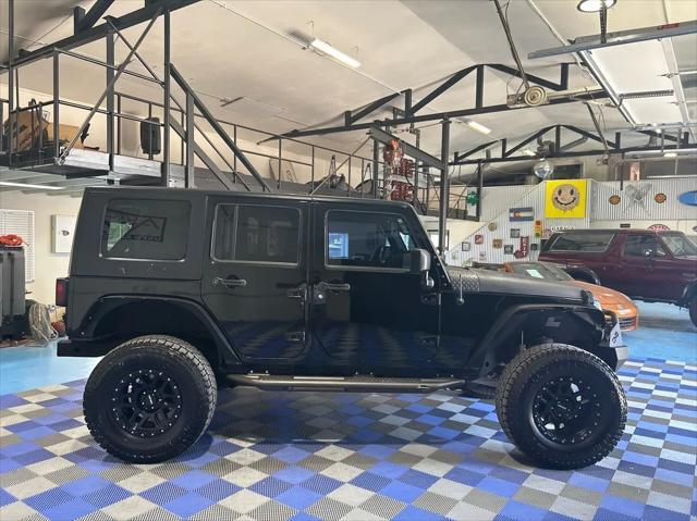 used 2009 Jeep Wrangler Unlimited car, priced at $13,999