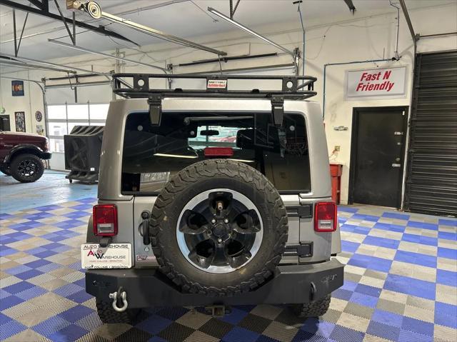 used 2014 Jeep Wrangler Unlimited car, priced at $18,999