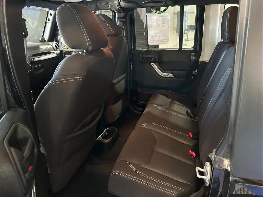 used 2013 Jeep Wrangler Unlimited car, priced at $18,588