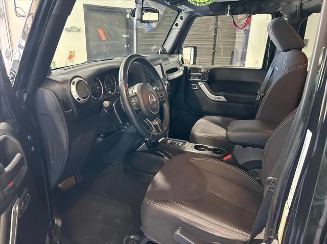 used 2013 Jeep Wrangler Unlimited car, priced at $18,588
