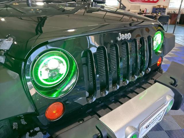 used 2013 Jeep Wrangler Unlimited car, priced at $18,588