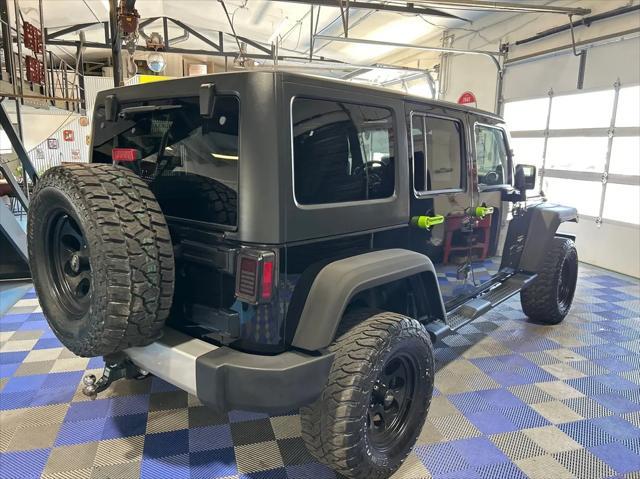used 2013 Jeep Wrangler Unlimited car, priced at $18,588