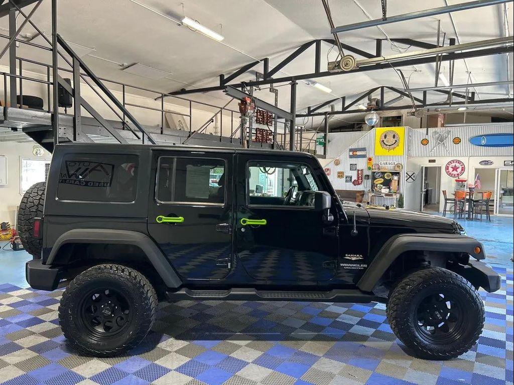 used 2013 Jeep Wrangler Unlimited car, priced at $18,588