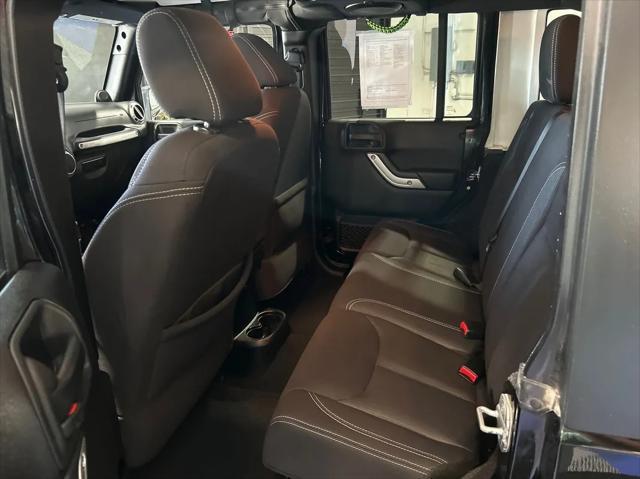 used 2013 Jeep Wrangler Unlimited car, priced at $18,588