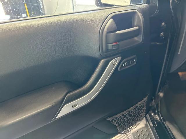 used 2013 Jeep Wrangler Unlimited car, priced at $18,588