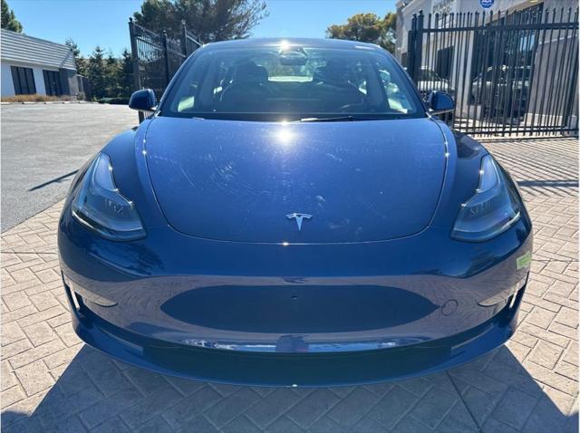 used 2023 Tesla Model 3 car, priced at $30,999