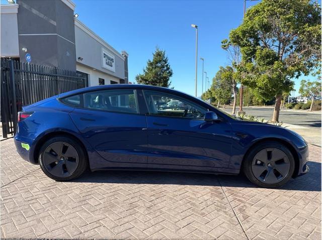 used 2023 Tesla Model 3 car, priced at $30,999