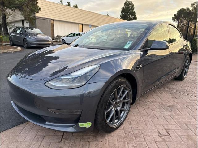 used 2023 Tesla Model 3 car, priced at $26,999