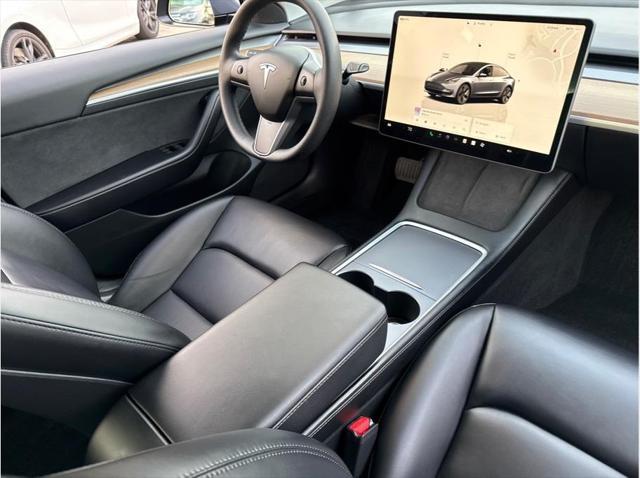 used 2023 Tesla Model 3 car, priced at $26,999