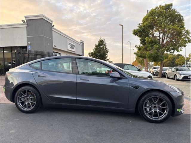 used 2023 Tesla Model 3 car, priced at $26,999