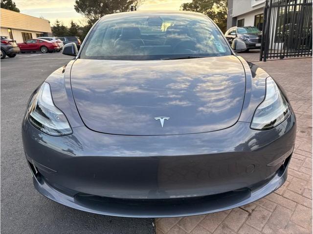 used 2023 Tesla Model 3 car, priced at $26,999