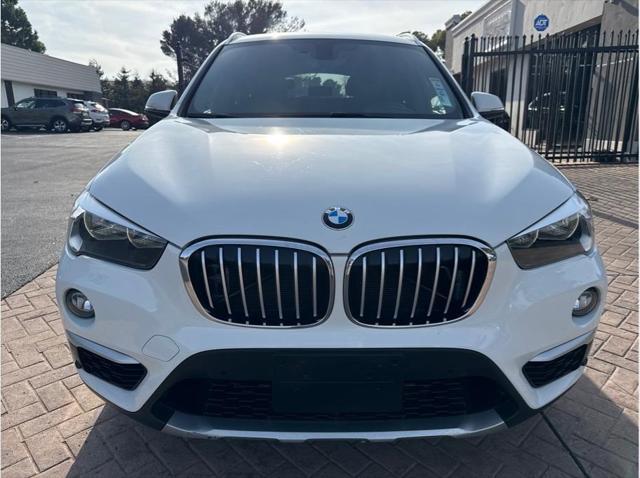 used 2018 BMW X1 car, priced at $14,999