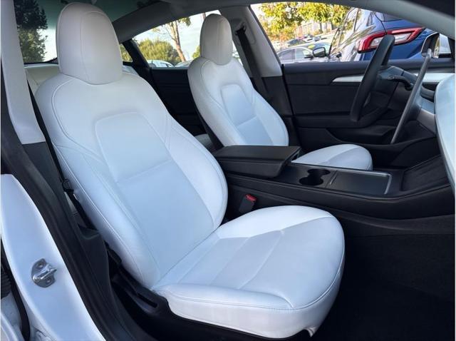 used 2022 Tesla Model 3 car, priced at $27,999