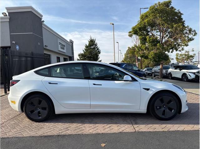 used 2022 Tesla Model 3 car, priced at $27,999