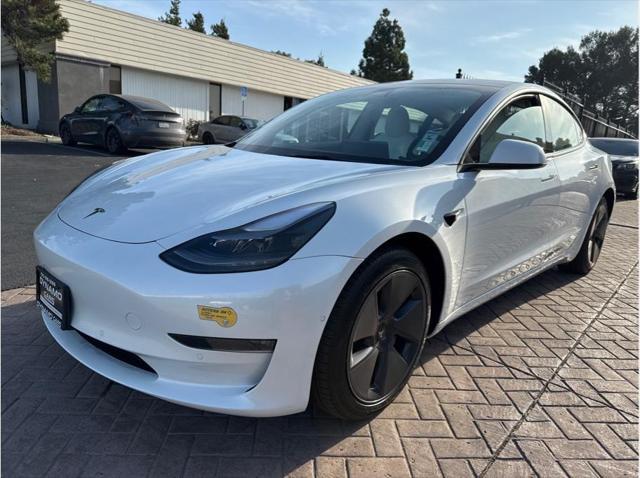 used 2022 Tesla Model 3 car, priced at $27,999