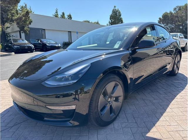 used 2021 Tesla Model 3 car, priced at $27,999