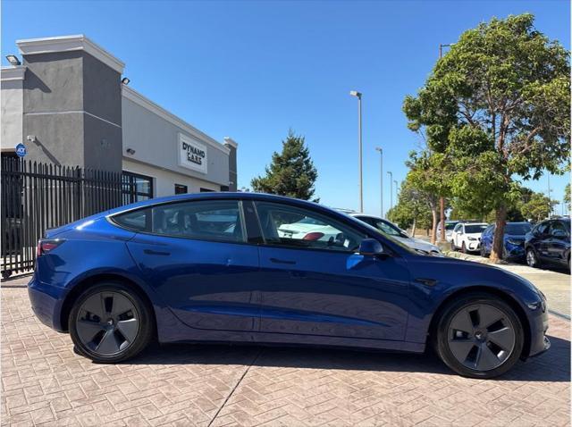 used 2022 Tesla Model 3 car, priced at $27,354