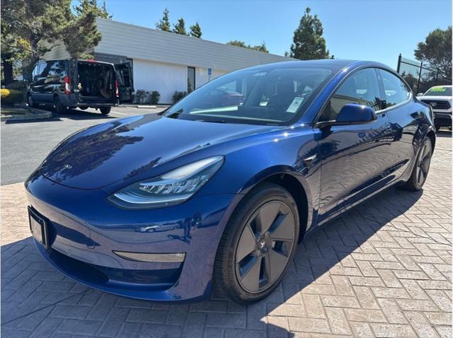 used 2022 Tesla Model 3 car, priced at $27,354