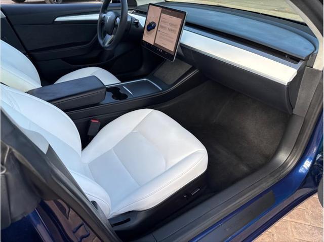 used 2023 Tesla Model 3 car, priced at $26,774