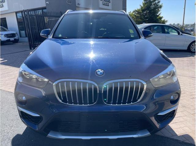 used 2018 BMW X1 car, priced at $17,999