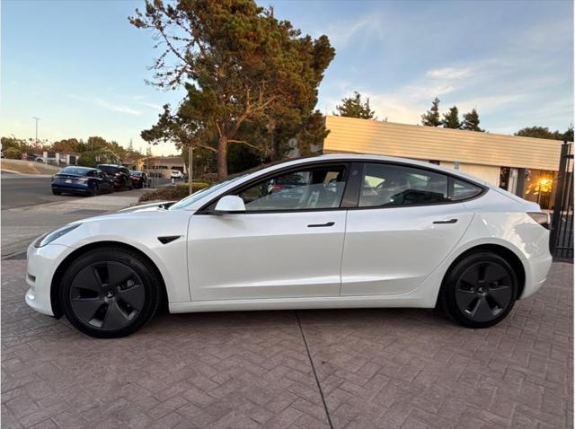 used 2022 Tesla Model 3 car, priced at $27,999