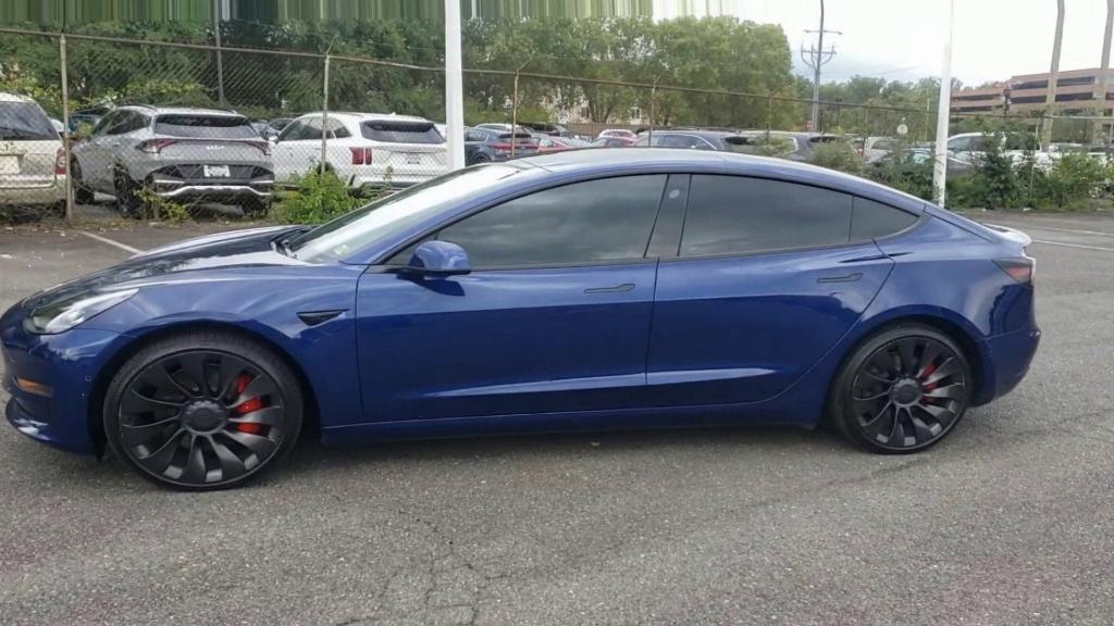 used 2022 Tesla Model 3 car, priced at $29,773