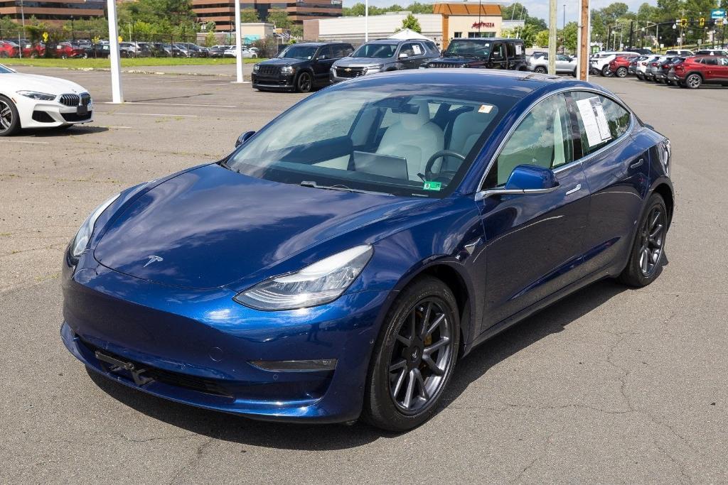 used 2018 Tesla Model 3 car, priced at $18,500