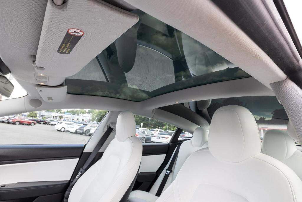 used 2018 Tesla Model 3 car, priced at $18,500
