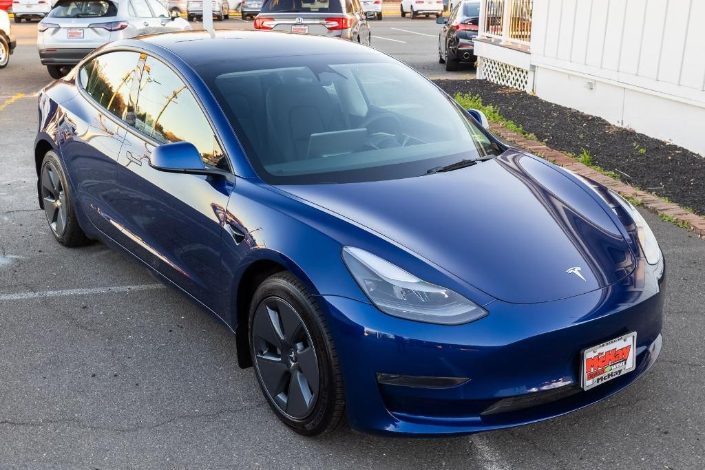 used 2023 Tesla Model 3 car, priced at $27,383