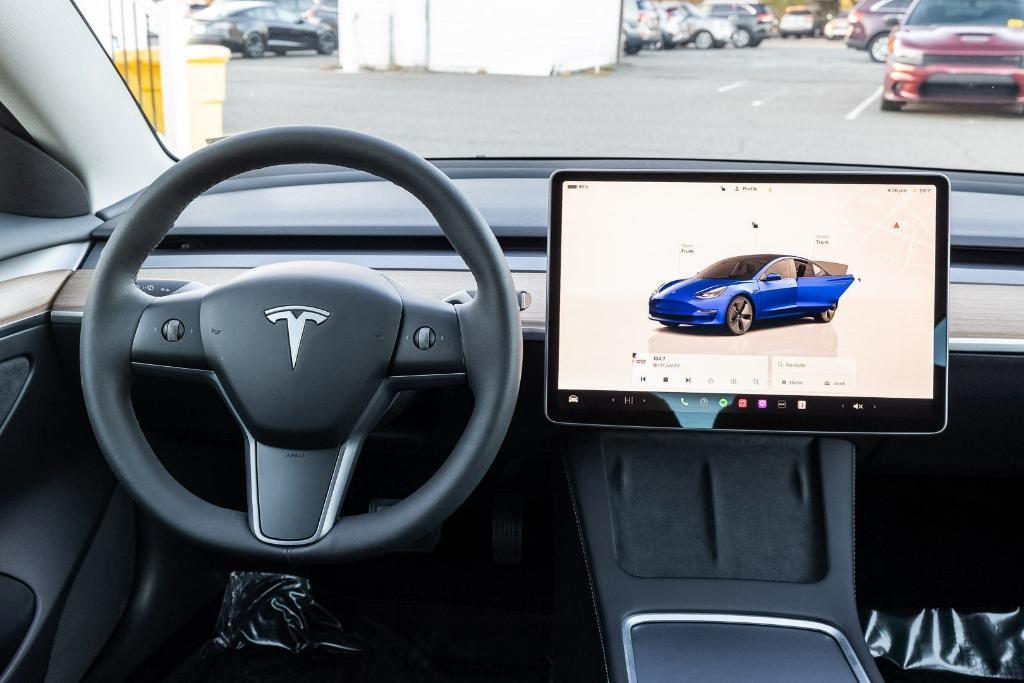 used 2023 Tesla Model 3 car, priced at $27,383