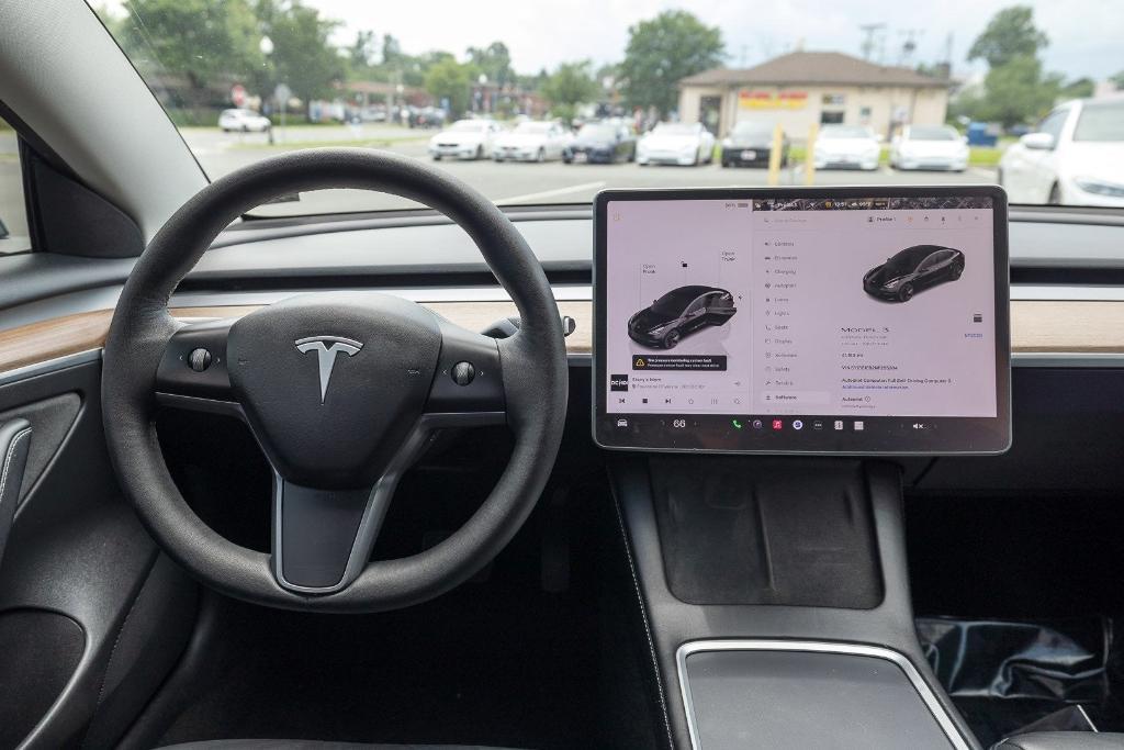 used 2022 Tesla Model 3 car, priced at $23,000