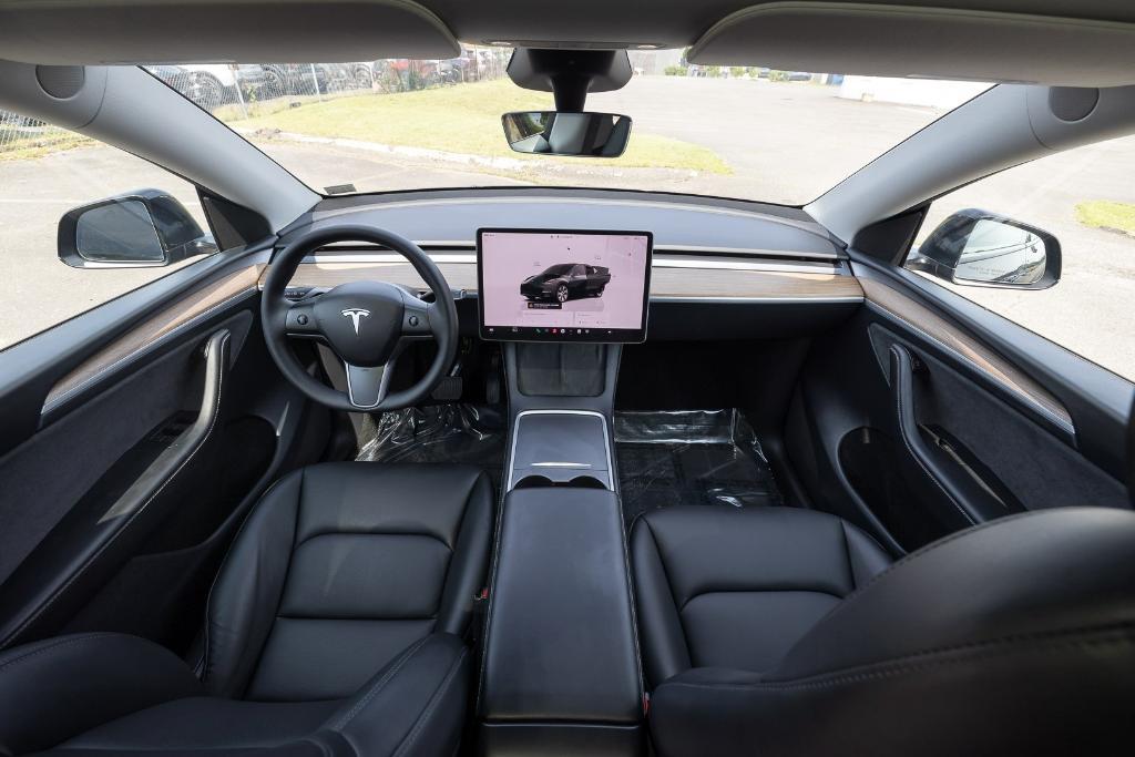 used 2023 Tesla Model Y car, priced at $28,500