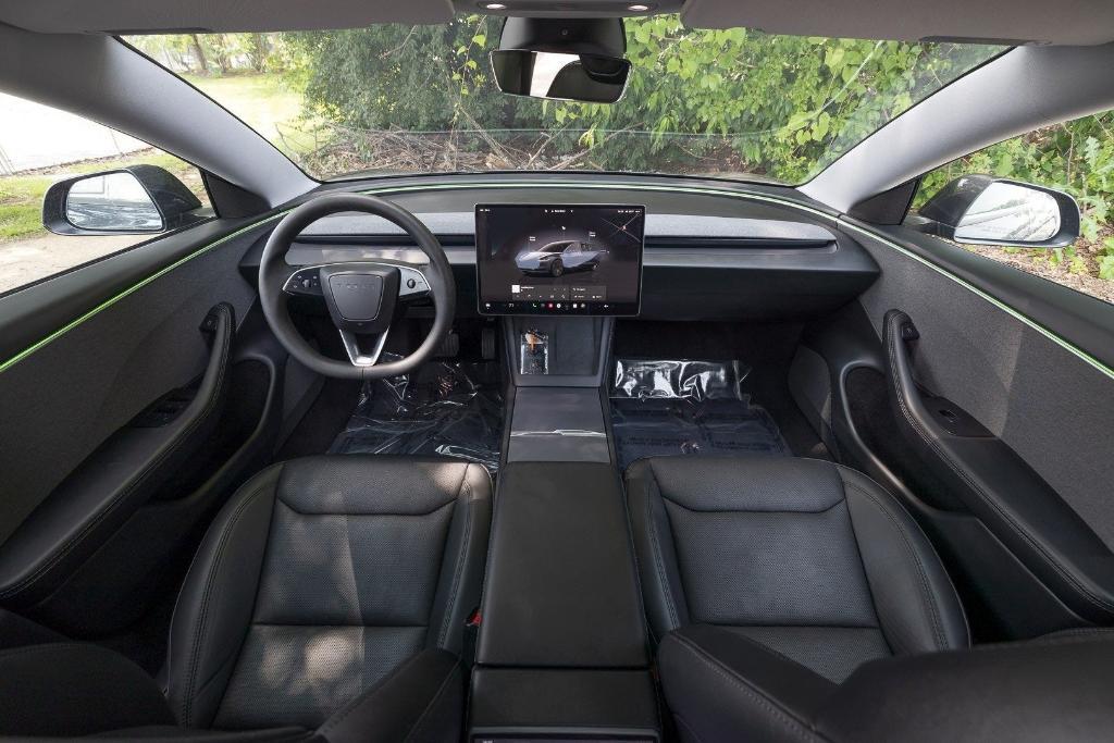 used 2024 Tesla Model 3 car, priced at $31,000