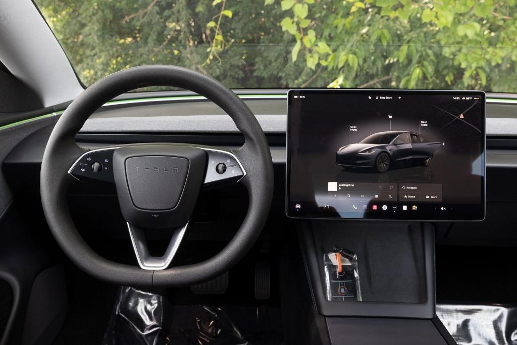 used 2024 Tesla Model 3 car, priced at $30,900