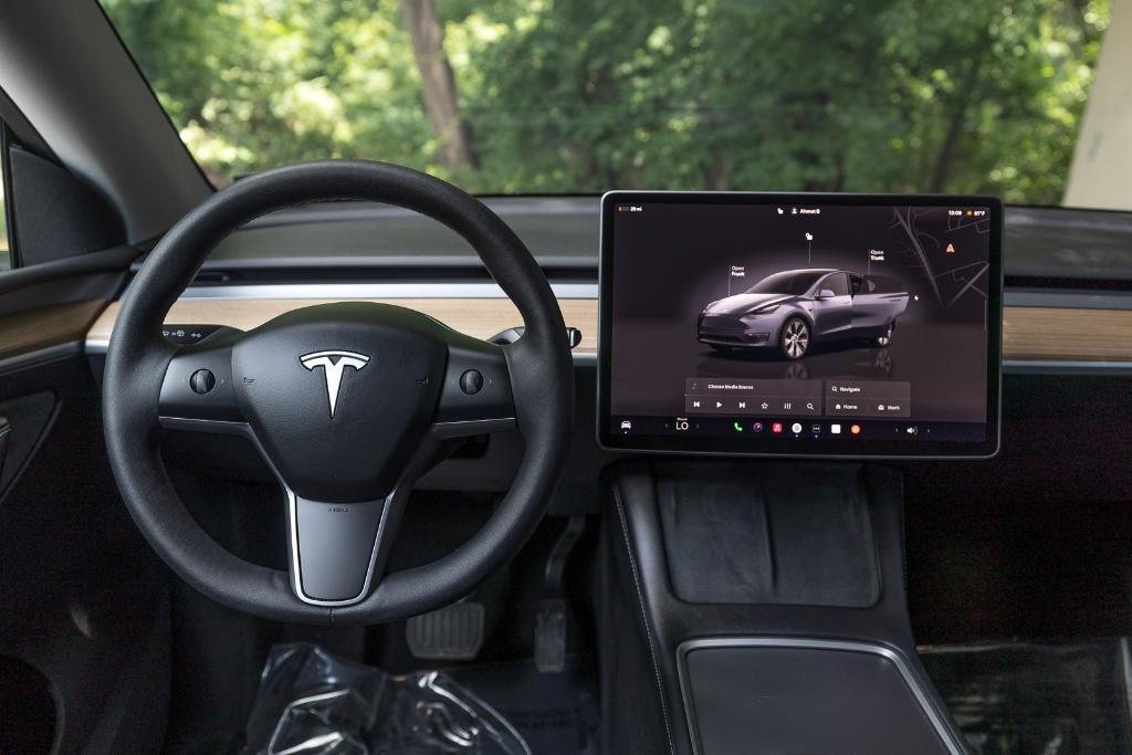 used 2023 Tesla Model Y car, priced at $31,000