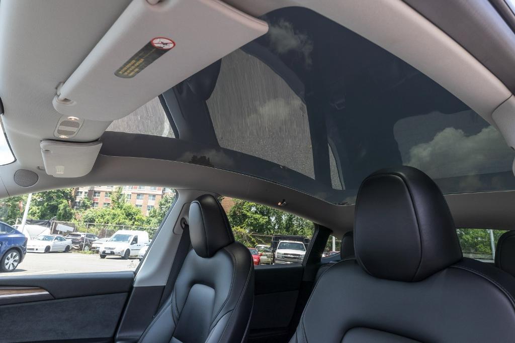 used 2023 Tesla Model Y car, priced at $31,000