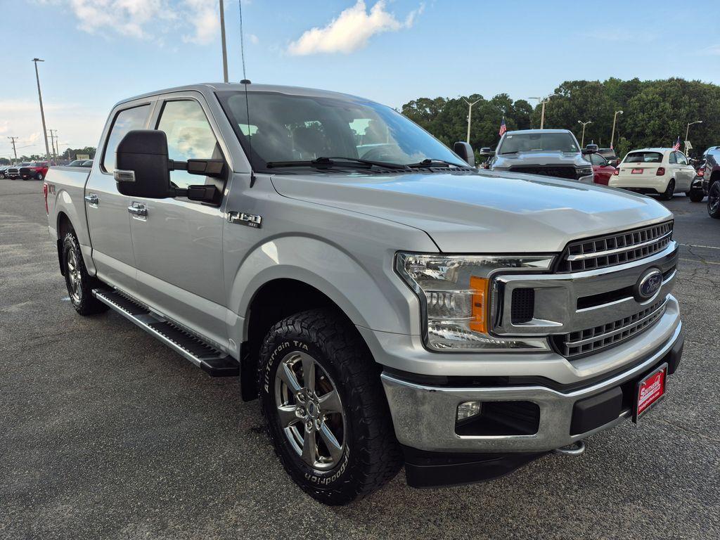 used 2018 Ford F-150 car, priced at $23,828