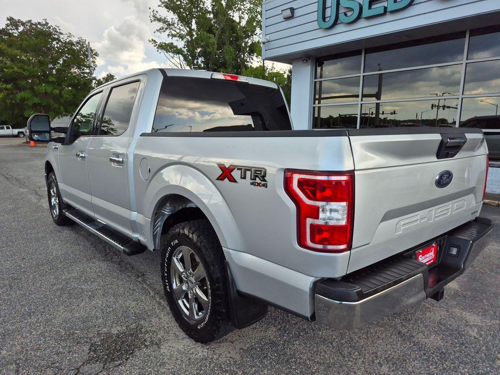 used 2018 Ford F-150 car, priced at $23,828