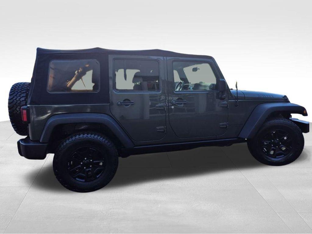 used 2015 Jeep Wrangler Unlimited car, priced at $17,965