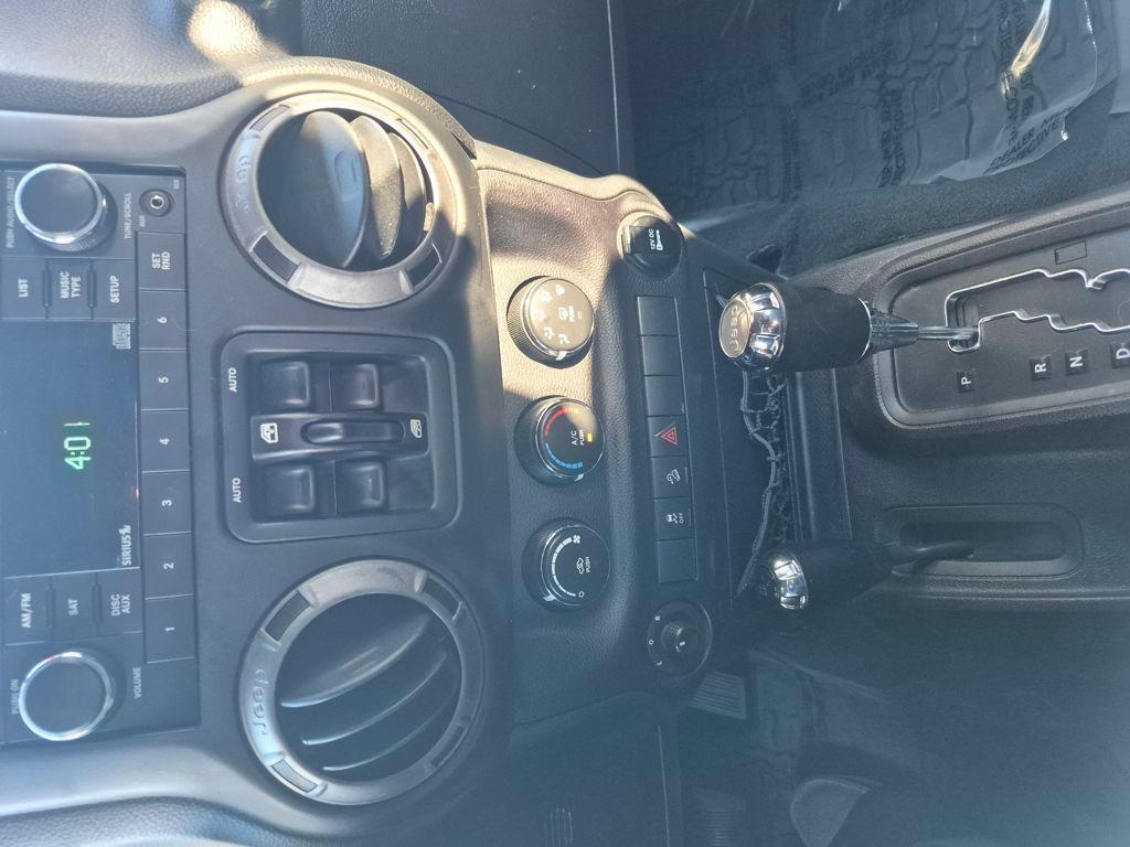 used 2015 Jeep Wrangler Unlimited car, priced at $17,965