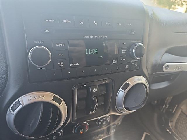 used 2015 Jeep Wrangler Unlimited car, priced at $25,500